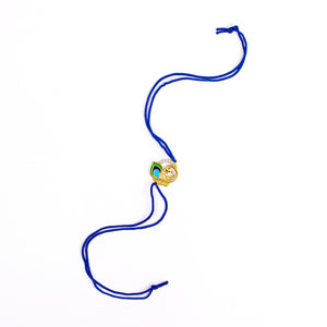 Regal Radiance Peacock Rakhi