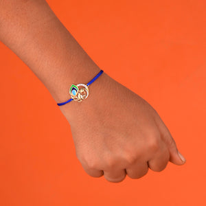 Regal Radiance Peacock Rakhi